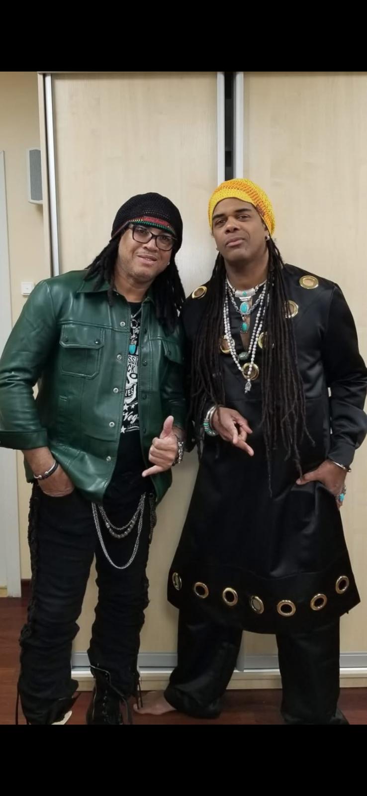 Paul KasticK with a collaborator backstage